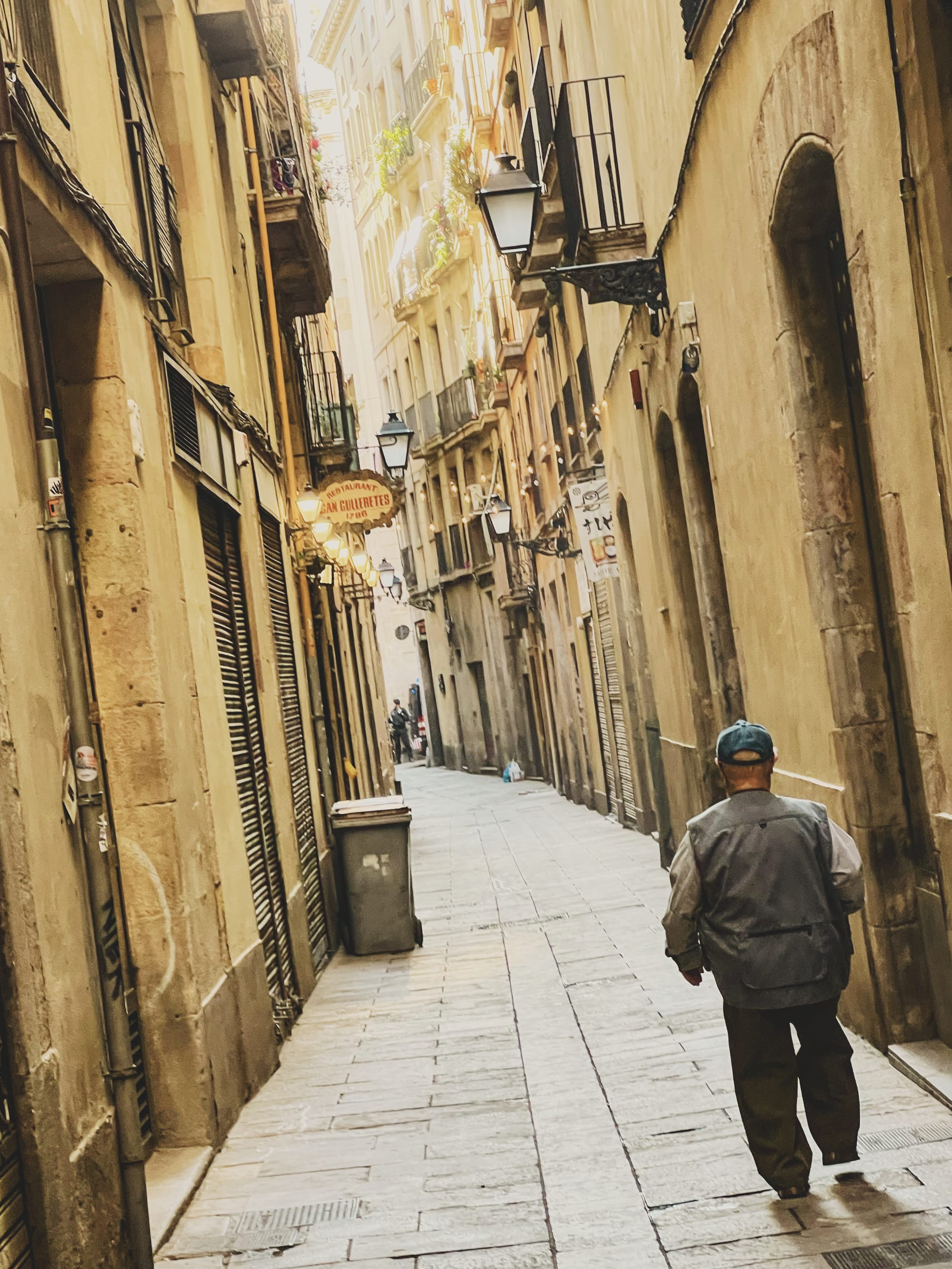 A person walking down a side street. Image Anthony Nelzin-Santos.