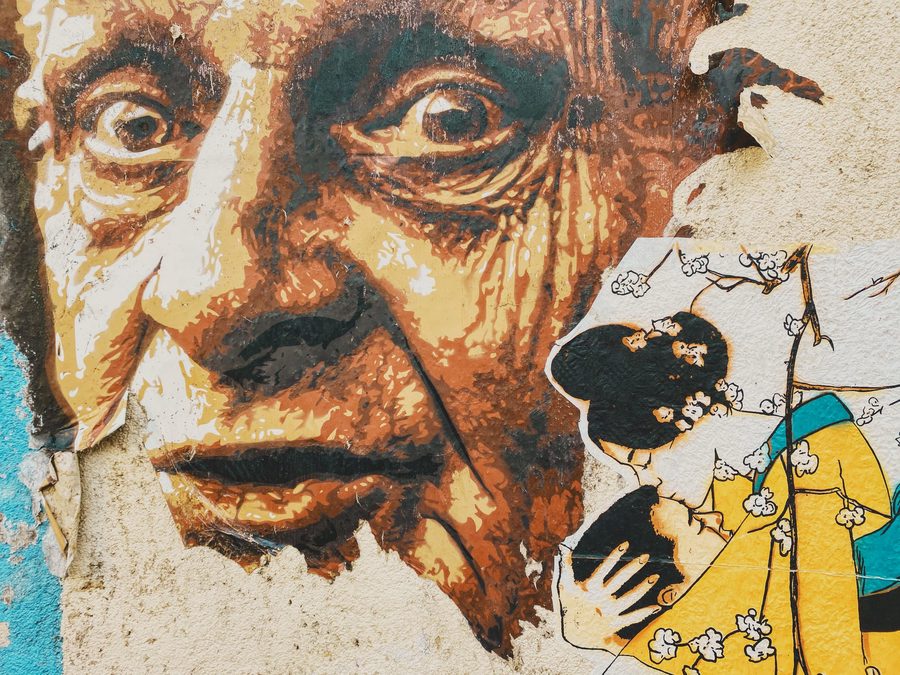 Various collages on a wall.