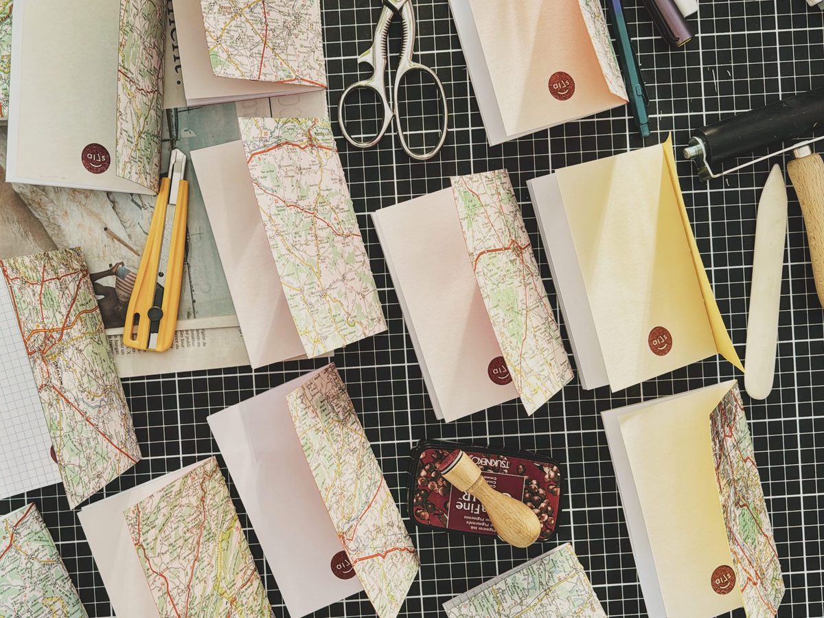 A batch of notebooks on a table. Image Anthony Nelzin-Santos.