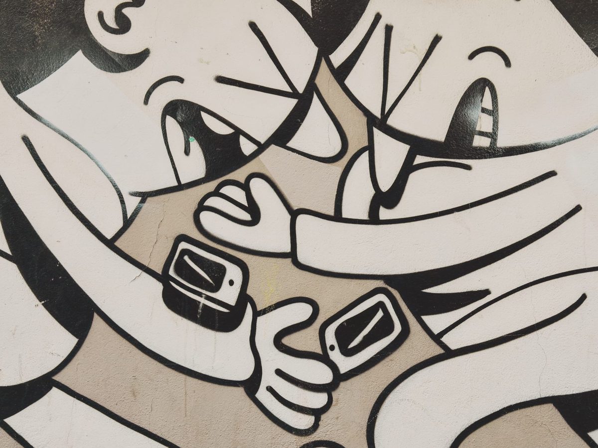 A mural of people bumping into each other because they were looking at their smartphone.