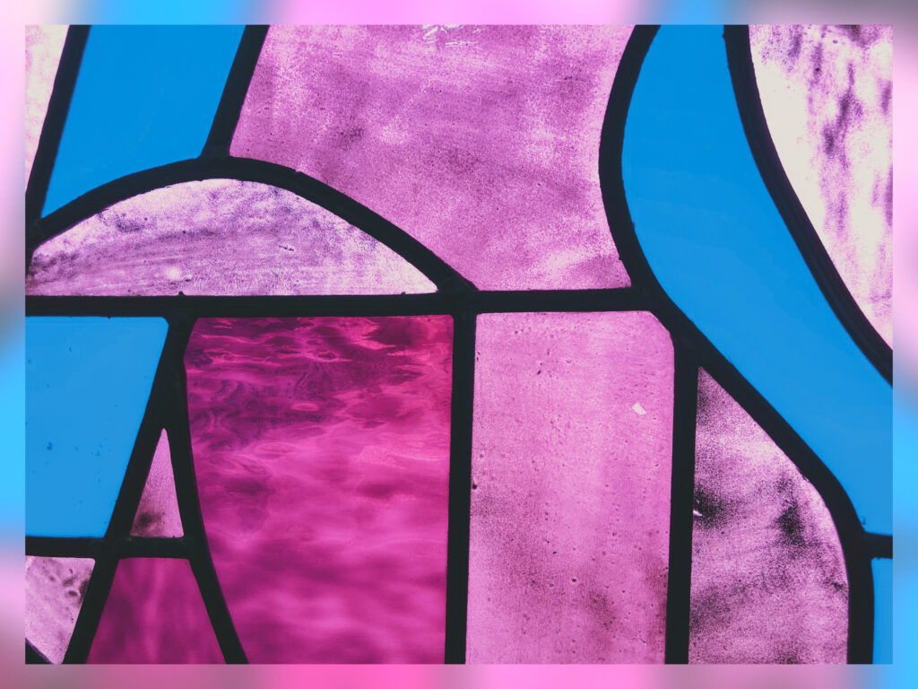 A purple, blue and pink stained glass.