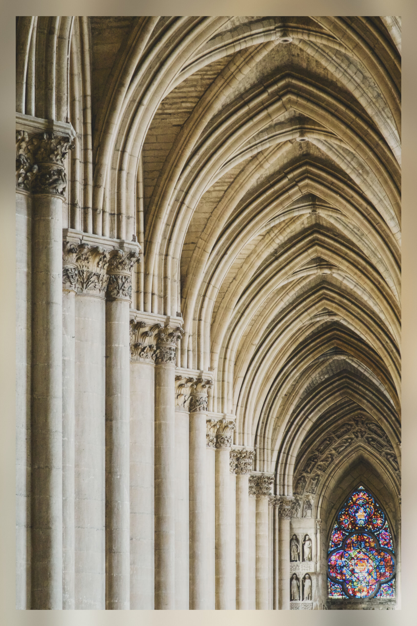 A row of arches inside the Reims cathedral.